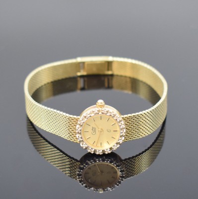 CITO Damenarmbanduhr in GG 585/000 mit Diamanten, Schweiz um 1975, quarz, Lünette aufw. m. Diamanten bes., Boden aufgedr., champagnerfarb. Zifferbl. ...