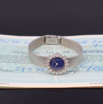 ETERNA Damenarmbanduhr in WG 750/000 mit Diamanten, Schweiz verk. lt. beil. Garantie 03/1973, Handaufzug, Geh. an Goldband 750/000, Boden aufgedr., ...