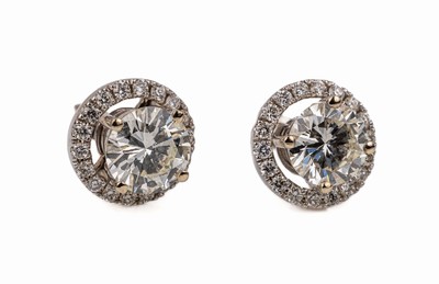 18 kt Gold Brillant-Ohrstecker, WG 750/000,2 Brillanten zus. ca. 1.65 ct feines Weiß- Weiß/vs-si, abnehmbarer Brillantkranz ca. 0.30ct feines ...