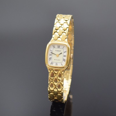 TISSOT Damenarmbanduhr in GG 750/000, Schweiz um 1985, quarz, 2-teil. Gehäuse, Boden aufgedr., 2-farb. Zifferbl. m. röm. Zahlen, schwarze Zeiger, ...