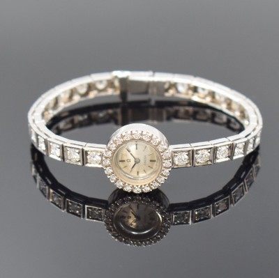 OMEGA ausgefallene Damenarmbanduhr mit aufwendigem Diamantenbesatz in WG 750/000, Schweiz um 1963, Handaufzug, sog. Backwinder, 2-teil. Geh., Boden ...