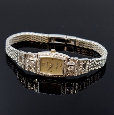 GUEPARD Damenarmbanduhr in WG 585/000 mit Diamanten, Schweiz um 1980, quarz, 2-teil. Geh., Boden aufgedr., Milanaiseband in WG 585/000, silb. ...