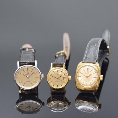 OMEGA Ladymatic Damenarmbanduhr in GG 750/000 und 2 weitere, Schweiz um 1970, 1. Omega, Automatik, Boden aufgedr., silb. Zifferbl. m. aufges. ...