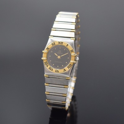 OMEGA Constellation Damenarmbanduhr in Stahl/ Gold Referenz 795.1080, Schweiz um 1990, quarz, gedr. Geh., integriertes orig. Band, Goldlünette m. ...