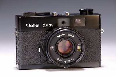 Rollei XF 35 Bj. 1974-80, Kleinbildkamera, mit Sonnar 1:2.3/40mm, Ledertasche; leichte Gebrauchsspuren