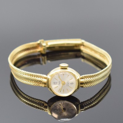 ESCO Damenarmbanduhr in GG 585/000, Schweiz um 1965, Handaufzug, gedr. Geh., anges. Milanaiseband, silb. Zifferbl., gold. Indizes u. -zeiger, ...