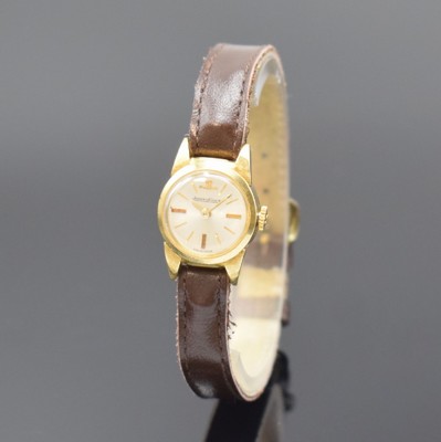 Jaeger-LeCoultre Damenarmbanduhr in GG 750/000, Schweiz um 1965, Handaufzug, Boden gedr., silb. Zifferbl. m. gold. Std.-Ind. (teils angel.), gold. ...