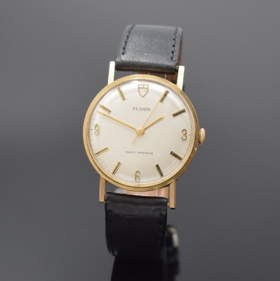 TUDOR Herrenarmbanduhr in GG 375/000, Schweiz f. den engl. Markt um 1960, Handaufzug, neutr. Geh., Boden aufgedr. (dell.), silb. Zifferbl. m. gold. ...
