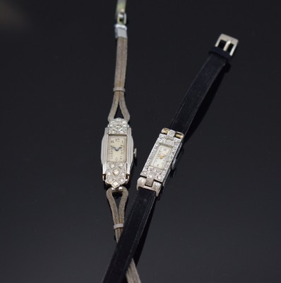 2 Diamantbesetzte Platin Art Deco Damenarmbanduhren, Schweiz um 1930, Handaufzug, 1.) Baguette-Geh., bewegl. Anstöße, Zifferbl.rest., silb. ...