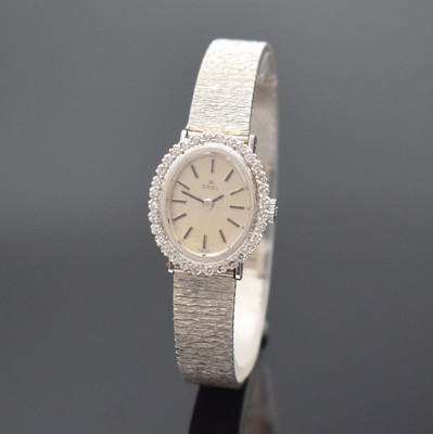 EBEL Damenarmbanduhr in WG 750/000 mit Diamanten, Schweiz um 1965, Handaufzug, Boden aufgedr., Lünette aufw. m. Diamanten bes., silb. Zifferbl. m. ...