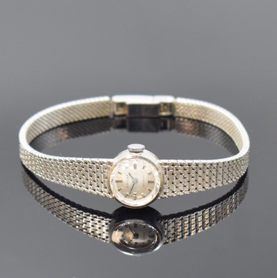 PRIOSA Damenarmbanduhr in WG 585/000, Schweiz um 1968, Handaufzug, 2-teil. Gehäuse, Boden aufgedr., Milanaiseband, silb. Zifferbl. m. aufges. ...
