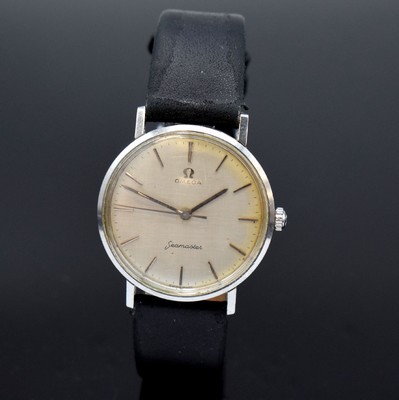 OMEGA Seamaster Herrenarmbanduhr, Schweiz um 1965, Handaufzug, Monocoque-Geh., Glasrand aufgedr., Boden m. Seamaster-Logo, silb. Zifferbl. fl., silb. ...