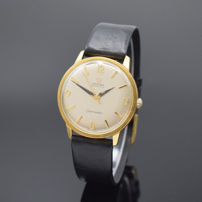 OMEGA Seamaster Herrenarmbanduhr Referenz 165.001, Schweiz um 1963, Automatik, verg. Geh., verschr. Boden, silb. Zifferbl. m. gold. Std.-Ind. u. ...