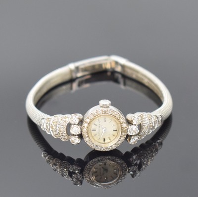 Art-Deco Damenarmbanduhr mit Longines Werk und Diamanten in WG 750/000, Schweiz um 1960, Handaufzug, Geh. u. Band bezeichnet Eszeha, Boden aufgedr., ...
