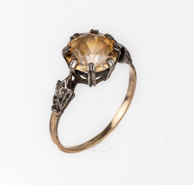 14 kt Gold Zirkon-Diamant-Ring, GG 585/000,um 1920, Ringkopf Silber, rundfacett. brauner Zirkon ca. 3.0 ct, Ringschultern mit 2 kl. ...