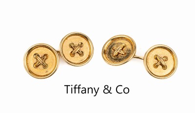Paar 18 kt Gold TIFFANY & Co Manschettenknöpfe, GG 750/000, runde Platten Form eines Knopfes, sign., ca. 9.6 g