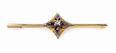 14 kt Gold Granat-Diamant-Brosche, GG 585/000, 1950er Jahre, Stabbrosche, mittig aufgesetztes Ornament mit 4 facett. Granaten und 1 kl. Diamant, L. ...