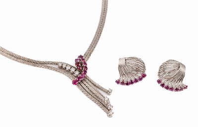 18 kt Gold Rubin-Brillant-Schmuckset, WG 750/000, best. aus: Collier, L. ca. 42 cm, 11 rundfacett. Rubine zus. ca. 1.0 ct, 10 Brillanten zus. ca. ...