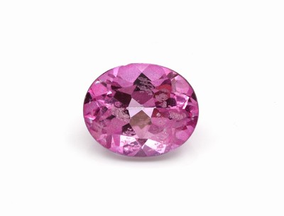 Loser pinkfarb. Topas (beh.), ca. 4.29 ct, ovalfacett.