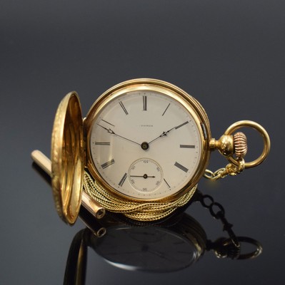 LONGINES sehr frühe Savonette mit Schlüsselaufzug in GG 750/000 und Goldkette, Schweiz um 1875, vollgrav. u. partiell schwarz emaill. 3-Deckel ...