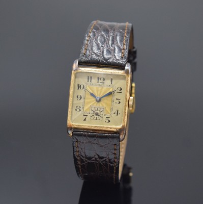 Frühe Armbanduhr in GG 585/000, Schweiz um 1920, Handaufzug, floral grav. Geh. dell., Scharnierboden, guill. Duoton-Zifferbl. m. arab. Zahlen, gebl. ...
