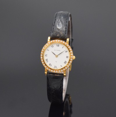 BUCHERER Damenarmbanduhr in GG 750/000 mit Brillantlünette, quarz, Schweiz um 2000, Boden 4-fach verschr., orig. Lederband m. verg. orig. Dornschl., ...