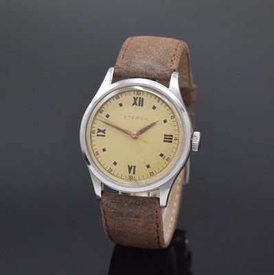 ETERNA seltene große Herrenarmbanduhr in Stahl, Schweiz um 1950, Handaufzug, verschr. Geh., silb. Zifferbl. pat., röm. Leucht- zahlen, gold. ...