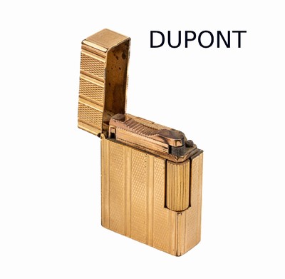 DUPONT Feuerzeug, Metall verg., Rillendekor, starke Gebr.-Spuren, sign. und num., in orig. Etui und Umkarton, mit Papierenund Garantiekarte