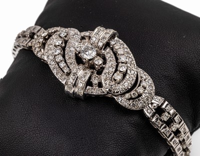 Prunkvolles 18 kt Gold Diamant-Armband, WG 750/000, ausgefallenes Design, Mittelteil bes.mit ca. 174 Diamanten zus. ca. 5.00 ct Weiß- ...