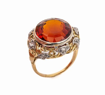 14 kt Gold Citrin-Diamant-Ring, 1950er Jahre, GG/WG 585/000, gepr., rundfacett. rotbrauner Citrin ca. 8.0 ct, Ringkopf mit Voluten und Spiralen, 8 ...