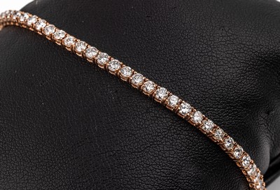 14 kt Gold Brillant-Armband, RG 585/000, 62 Brillanten zus. ca. 5.05 ct feines Weiß- Weiß/vvs-si, L. ca. 18 cm, Kastenschloss mit ...