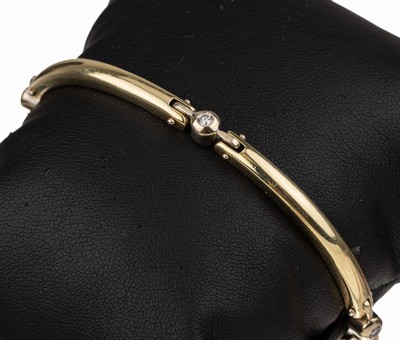 14 kt Gold Brillant-Armband, GG/WG 585/000,gepr., schlicht, längliche Glieder, 4 in WG gefasste Brillanten zus. ca. 0.28 ct Weiß/si, L. ca. 19.5 ...