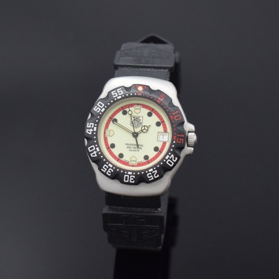 TAG HEUER Professional Formula 1 Armbanduhr in Stahl Referenz WA1211, Schweiz um 1995, quarz, matt. Geh., Boden verschr., orig. Kautschukband m. ...