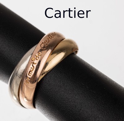 18 kt Gold must de CARTIER Ring/Anhänger, GG/WG/RG 750/000, aus der Trinity-Serie, sign., num., RW 44, mit Zertifikat
