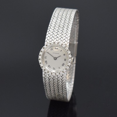 ETERNA Damenarmbanduhr in WG 750/000, Schweiz um 1970, Handaufzug, 2-teil. Gehäuse, Boden aufgedr., Lünette m. Diamanten bes., silb. Zifferbl. m. ...