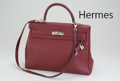 HERMES KELLY Bag 35, bordeauxfarb. Togo Leder, Palladium Hardware (PHW), Trageriemen, Palladium-Clochette, ca. 35 x 14 cm, Boden- kanten mit ...