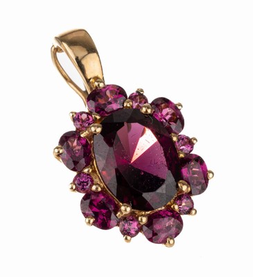14 kt Gold Almandin-Clipanhänger, GG 585/000, 1 ovalfacett. und 12 rundfacett. Almadine von schöner intensiver Farbe zus. ca. 3.0 ct, L. ca. 2.4 ...