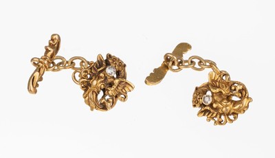 Paar 18 kt Gold Jugendstil-Manschettenknöpfe, um 1910, GG 750/000, Drachen mit Diamantrosen im Maul, 2 Diamantrosen zus. ca. 0.06 ct, total ca. ...