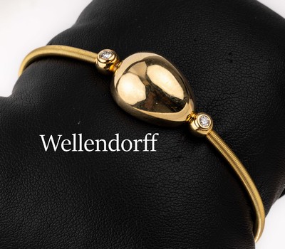 18 kt Gold WELLENDORFF Brillant-Armspange, GG 750/000, tropfenf. Mittelteil, seitl. bes. mit 2 Brillanten zus. ca. 0.15 ct feines Weiß/vs, Reif ...