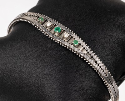 14 kt Gold Smaragd-Brillant-Armband, WG 585/000, 3 rundfacett. Smaragde zus. ca. 0.20 ct, 2 Brillanten zus. ca. 0.20 ct Weiß/si, L. ca. 19.3 cm, ...