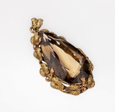 14 kt Gold Rauchquarz-Anhänger, GG 585/000,1950er Jahre, mittig facett. Rauchquarz -Tropfen, Rahmung mit Blättern, ca. 4 x 2 cm, ca. 6.6 g