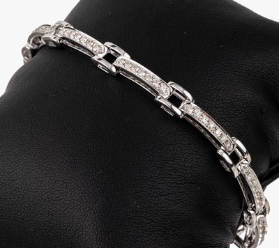 18 kt Gold Brillant-Armband, WG 750/000, 63Brillanten zus. ca. 1.64 ct Weiß/si, L. ca. 17.5 cm, Klappverschluss, ca. 20.6 g