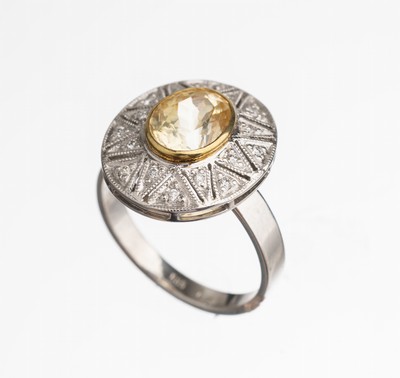 14 kt Gold Saphir Brillant Ring, WG/GG 585/000, mittig in GG gefasster ovalfacett. gelberSaphir ca. 4.0 ct, sternförmig umgeben von 16 Brillanten ...