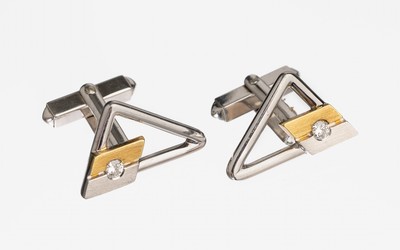 Paar 14 kt Gold Brillant Manschettenknöpfe, WG/GG 585/000, geom. Form, mit aufgelegtem GG/WG Element mit 2 Brillanten zus. ca. 0.26 ct feines ...