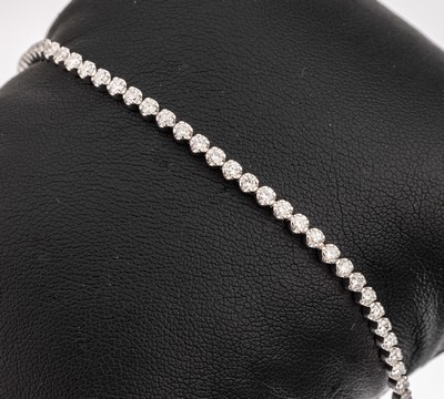 14 kt Gold Brillant-Armband, WG 585/000, Brillanten zus. ca. 2.07 ct feines Weiß- Weiß/vs-si, L. ca. 18.2 cm, Kastenschloss mit Sicherheitsachten