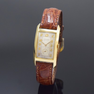 GRUEN Curvex Armbanduhr in GG 585/000, Schweiz fürUSA um 1940, Handaufzug, Boden aufgedr., silb. Zifferbl. m. arab. Zahlen, gold. Zeiger, sign. Werk ...