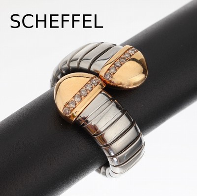 18 kt Gold und Stahl SCHEFFEL Brillant-Ring, GG 750/000, Ringschiene Stahl, 14 Brillanten zus. ca. 0.21 ct nat. brown/vs-si, RW 56