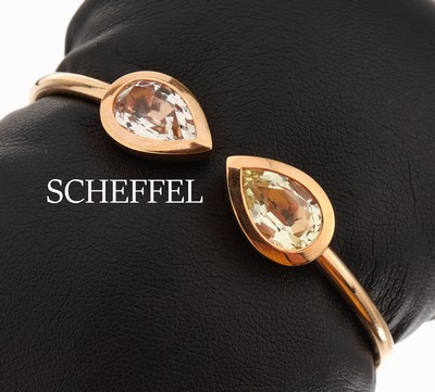 18 kt Gold SCHEFFEL Quarz-Armreif, GG 750/000, in sich bewegl., 1 facett. Lemonquarztropfen ca. 2.64 ct, 1 facett. Rauchquarztropfen ca. 2.63 ct, ...