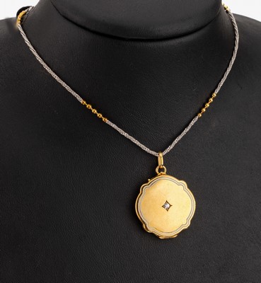 14 kt Gold Medaillon-Anhänger, GG 585/000, mittig ein kl. Brillant, Glaseinlage fehlt, an Kette, Zwischenglieder aus GG Kugeln, L. ca. 80 cm, ...