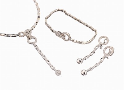 18 kt Gold Brillant-Schmuckset, WG 750/000,best. aus: Collier, L. ca. 47 cm, Armband, L. ca. 19 cm, Klappschliesse, Paar Ohrstecker, ca. 300 ...